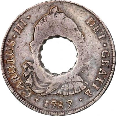 11 Bits Crenated center hole in Bolivia 8 Reales, KM# 55 ND front