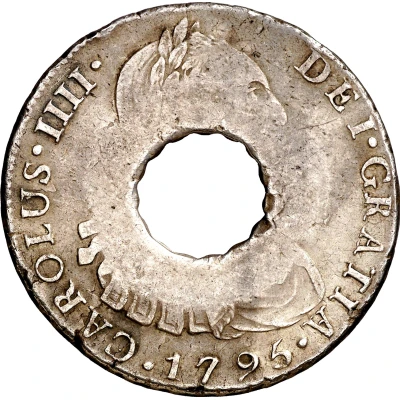 11 Bits Crenated center hole in Peru 8 Reales, KM# 97 ND front